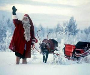yapboz Noel Baba onun atlı kızak ile sallayarak